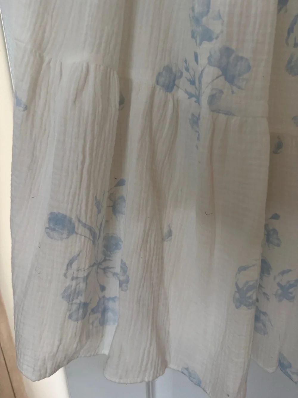 White Maxi Dress with Light Blue Floral Accent and Pockets - Picture 4 of 6